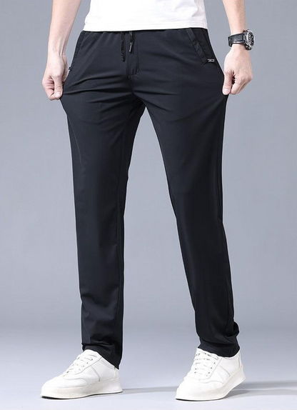 ❄️👖【Kupte 1 a získejte 1 zdarma ✨】【M–5XL】Letní tenké pánské rovné kalhoty z ledového hedvábí ✅ Vysoká elasticita ✅ Prodyšné a rychleschnoucí